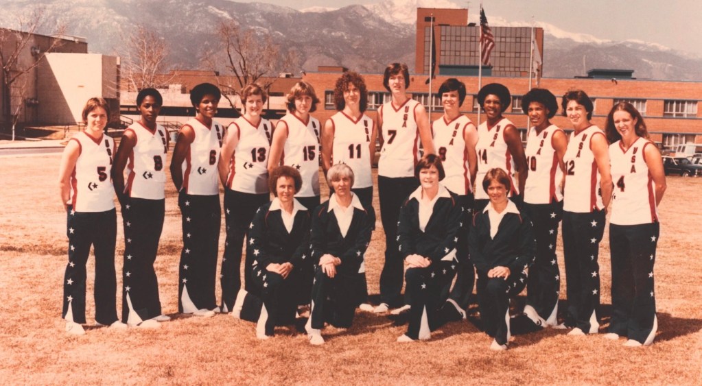 The members of the 1980 Olympic women's basketball team pose for a photo.